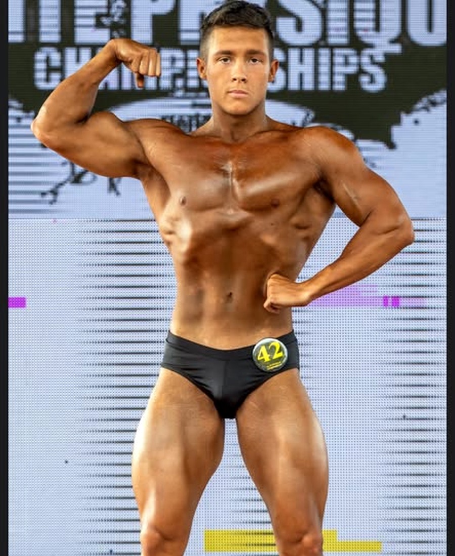 Coach Jeremy front-flex competition pose